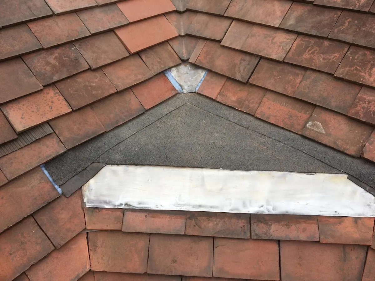 Bay window roof and chimney repair